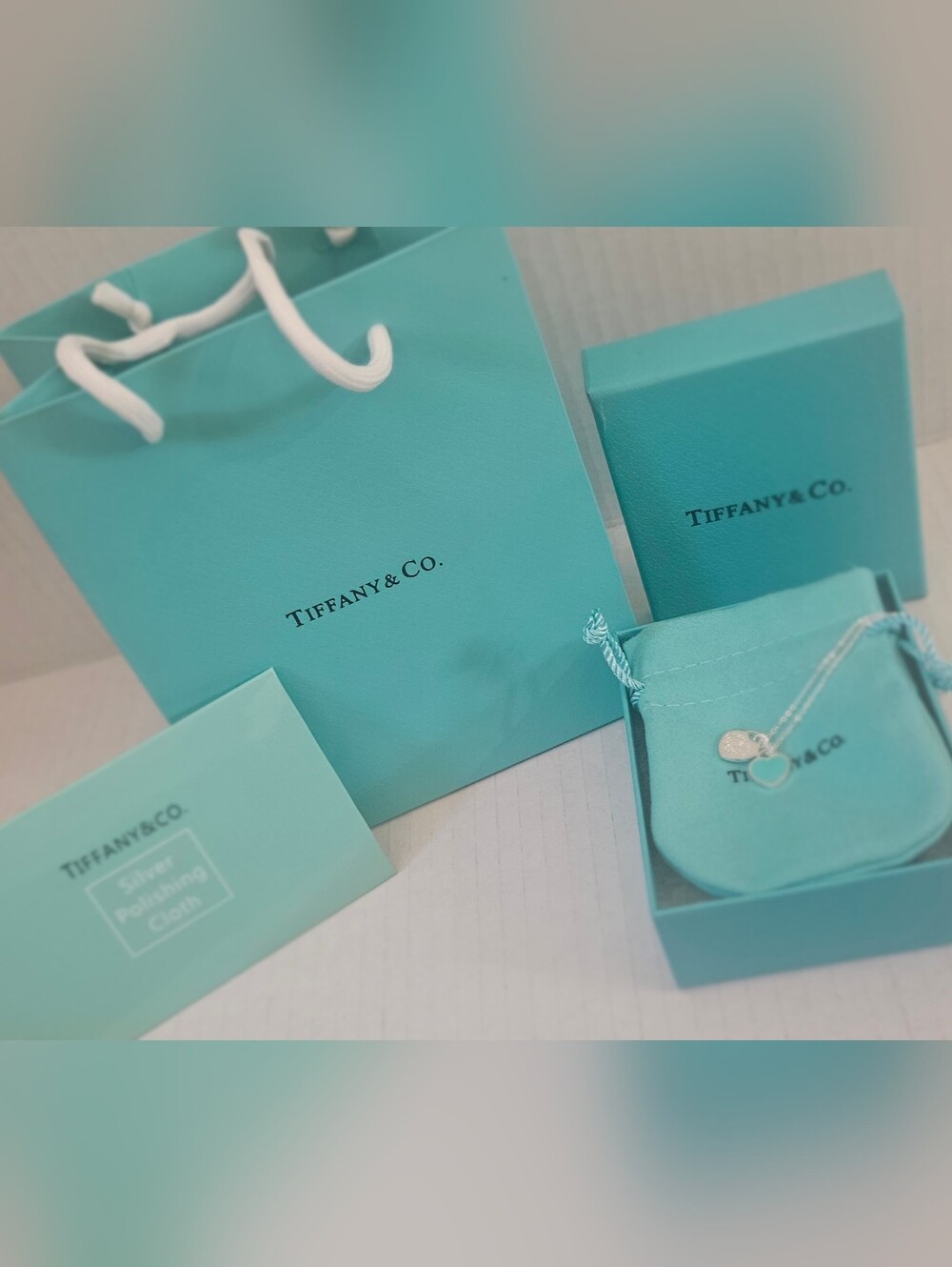 Sterling Silver And Blue Hearts Pendant Necklace with Blue Pouch